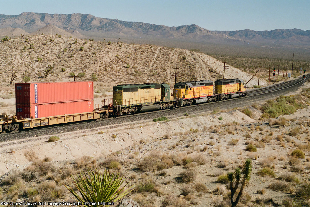 Union Pacific SD40-2 #3524 leads a doublestack container train downgrade 
